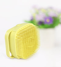 Silicone body brush with built-in shampoo dispenser