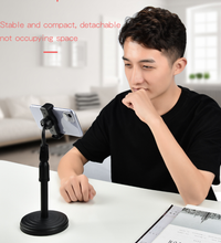 Adjustable mobile phone stand, suitable for desktop use, sturdy and height adjustable.