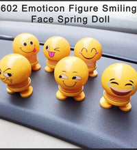 Spring doll with smiley face emoticon