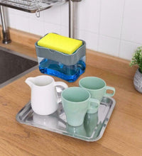 Compact countertop soap dispenser with sponge storage