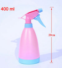 Multi-purpose spray bottle for garden tasks.