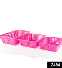 Multiple size plastic fruit baskets, large, medium, and small