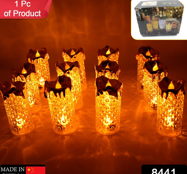 Set of gold flameless LED candles with a warm glow, ideal for home decor and special occasions.