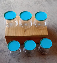 Set of 6 multicolour matka-shaped jars with airtight lids