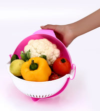 Convenient vegetable cutter and rotating basket combo.