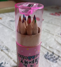 Kids art supplies with colored pencils and sharpener