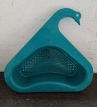 Swan-shaped strainer for wash basins and sink drainage