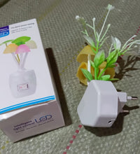 LED night light with automatic on/off and color-changing capabilities.