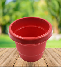 Durable plastic plant pot, 13 cm, ideal for indoor or balcony gardens, single unit.