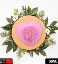 Silicone facial scrubber with heart shape, perfect for exfoliating skin