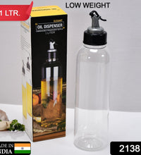 Clear oil dispenser with lid and controlled spout