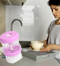 Multicolour wash basin brush with liquid soap dispenser.